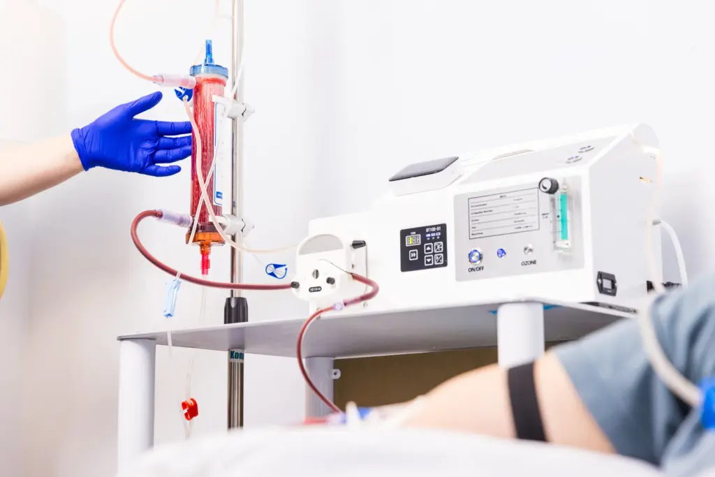 A woman is receiving EBOO Therapy in Chico, CA at TrueU Wellness