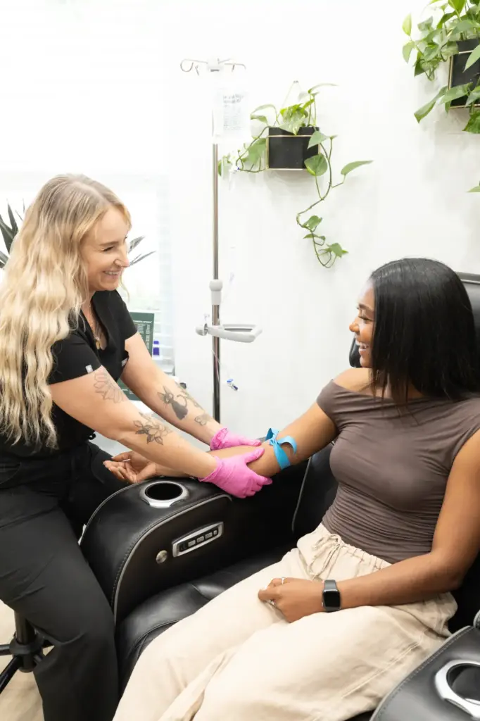 A woman is receiving IV therapy in Chico, CA at TrueU Wellness